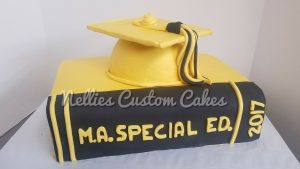 Graduation book cake grad cap cake buttercream Kansas city
