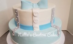 Baby bow suspenders and bow tie tierd cake -